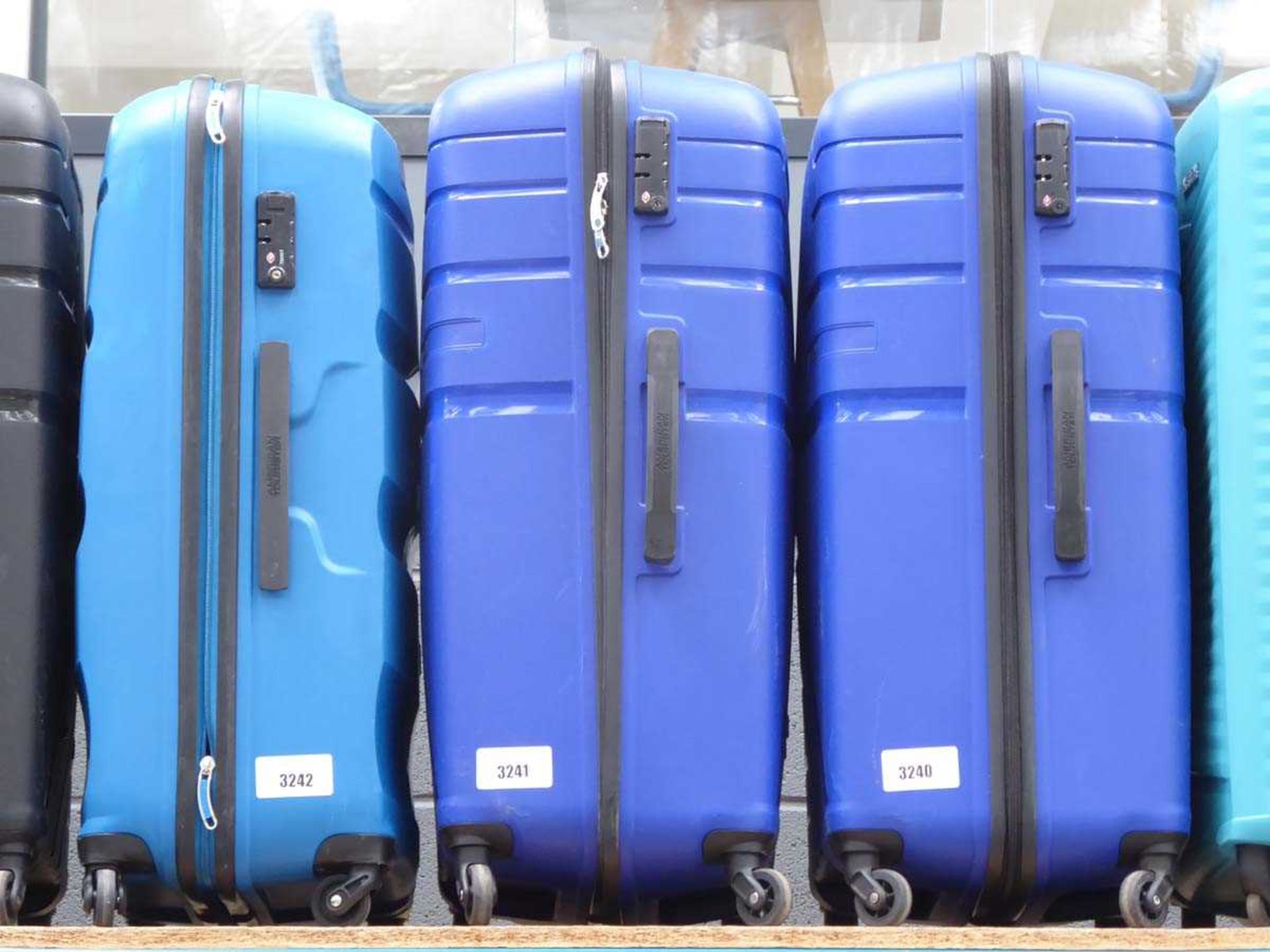 +VAT Large hard shelled American Tourister suitcase