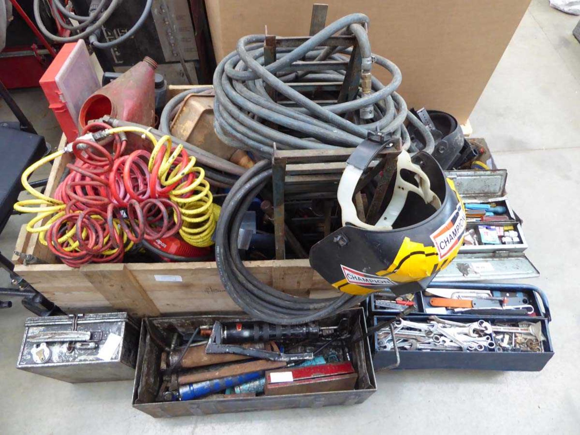 +VAT Crate containing various tools including air suzies, air hoses, car ramps and a large qty of