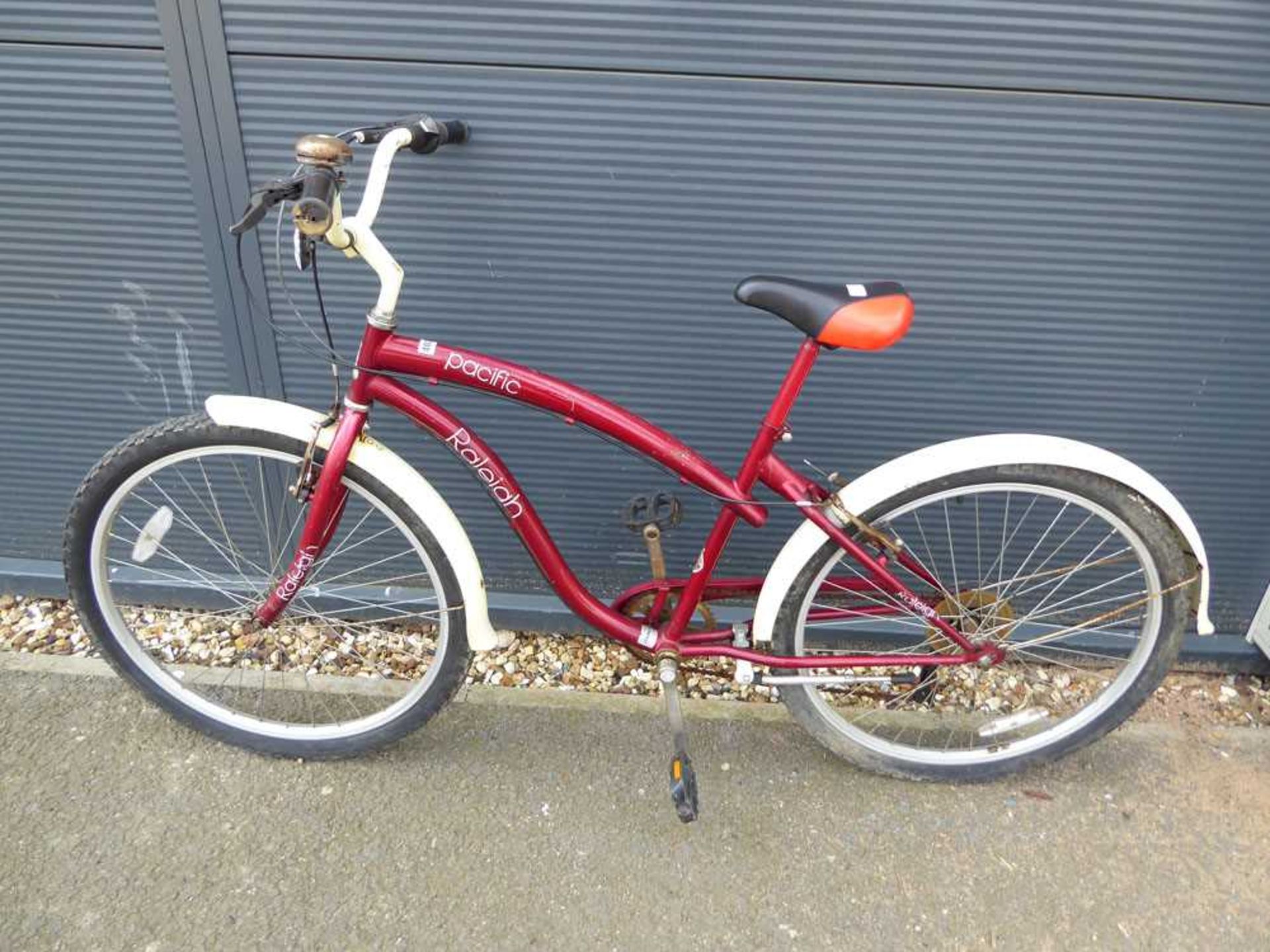 Red and cream pacific Raleigh girls bike