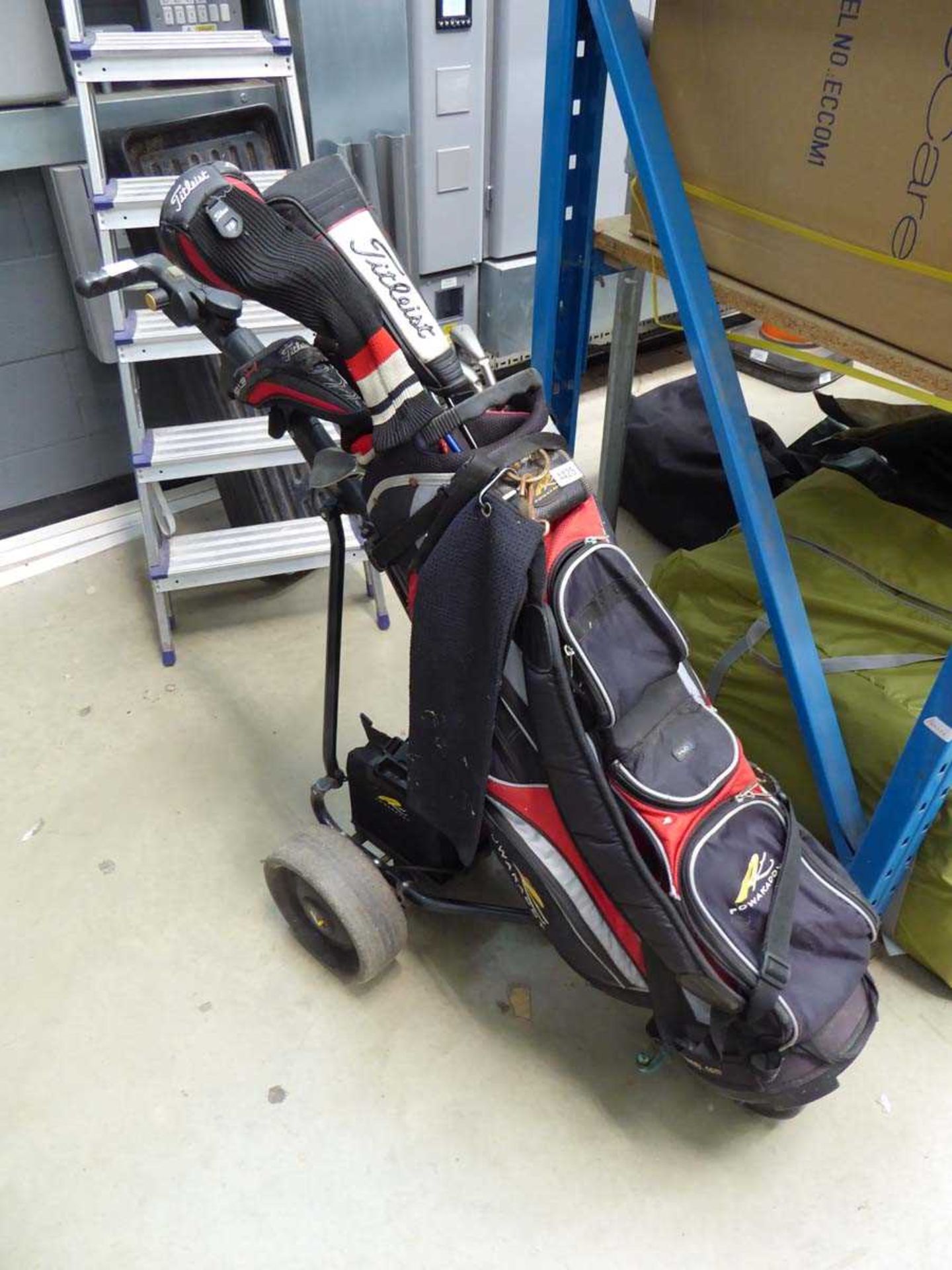 PowerCaddy electric golf trolley, complete with bag and assorted King and Titleist golf clubs