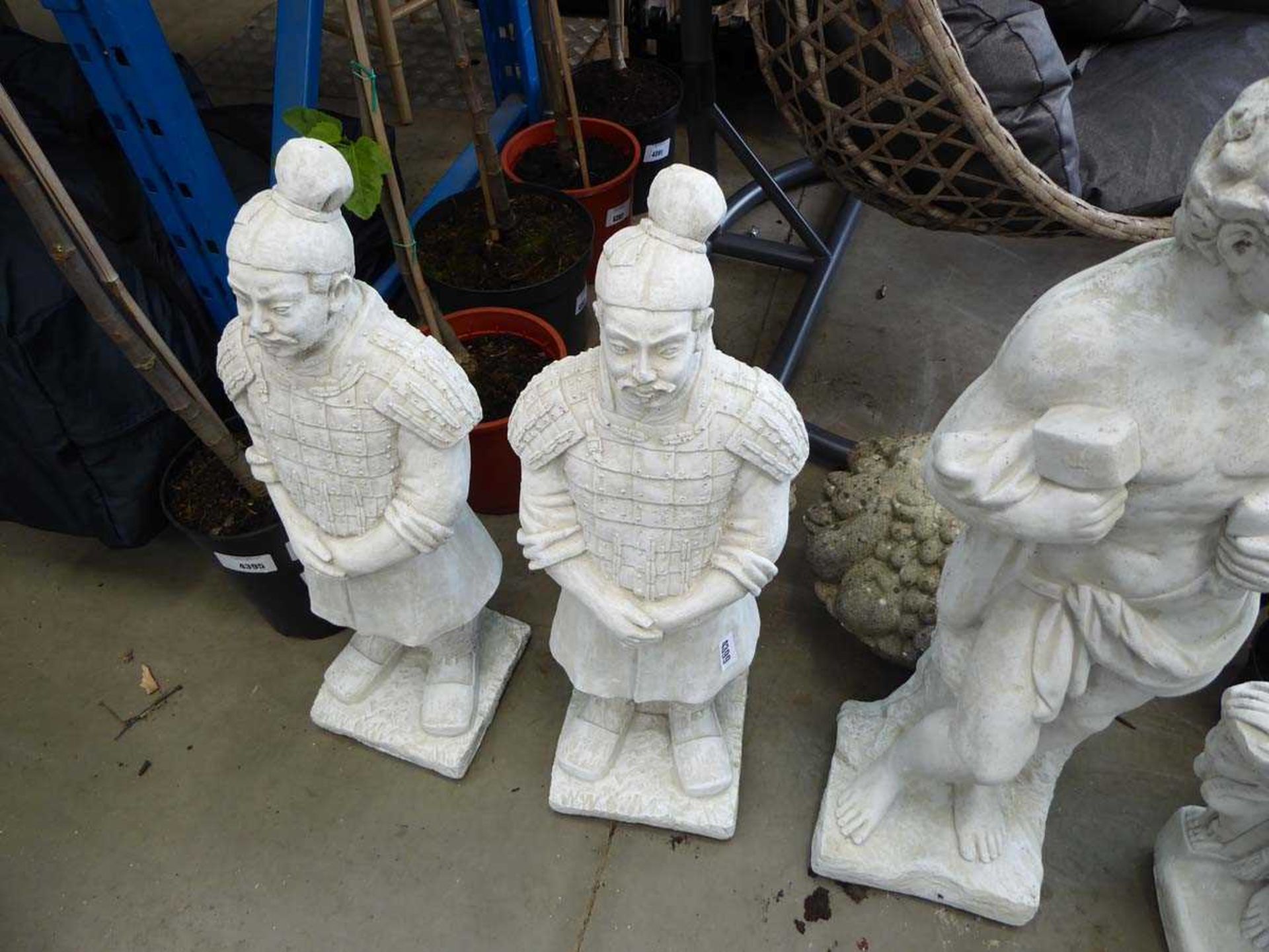 2 concrete terracotta warriors