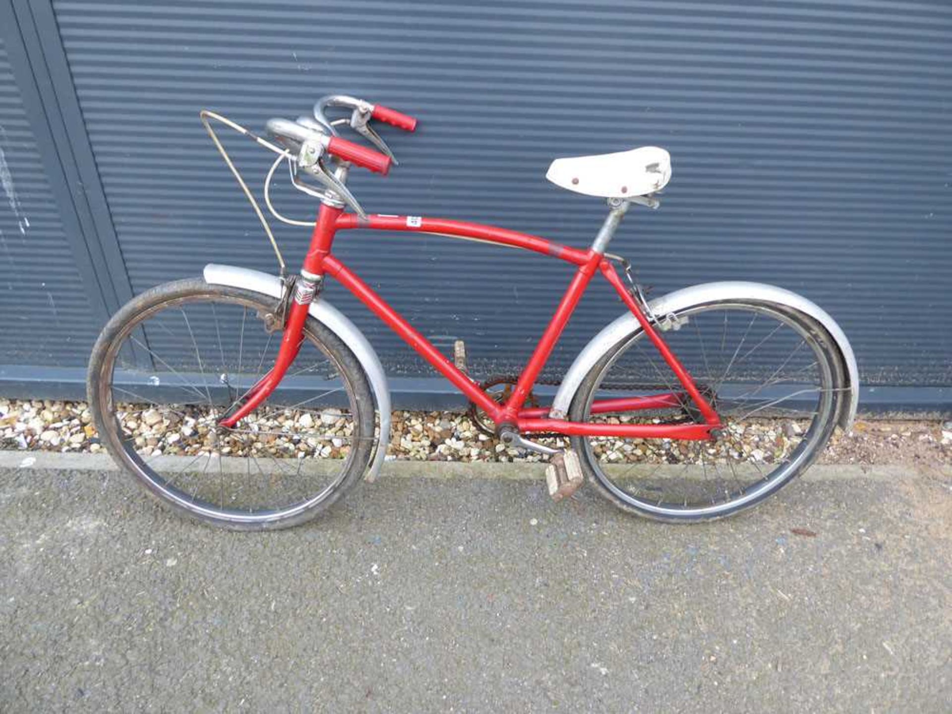 Small vintage red and white child's bike