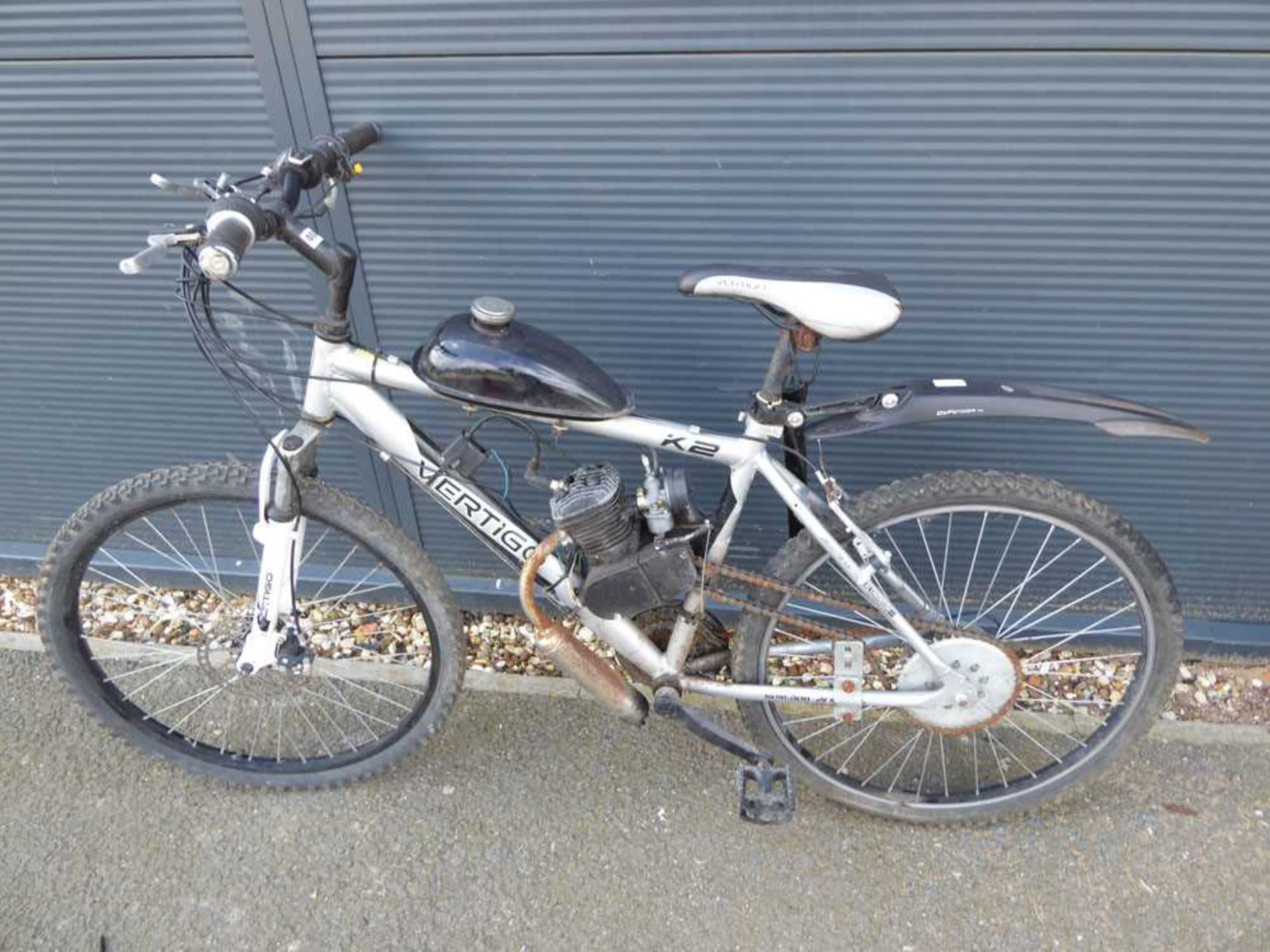 Vertigo silver and black petrol powered push bike