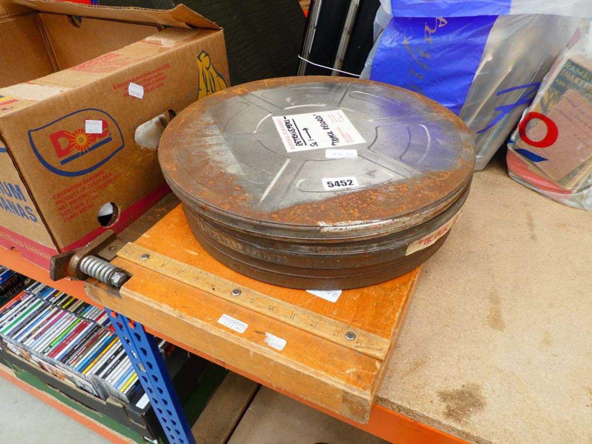 2 film reel canisters and a guillotine