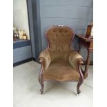 Carved Victorian button back library chair