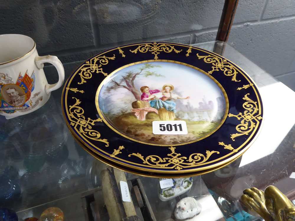 Pair of Continental painted cabinet plates