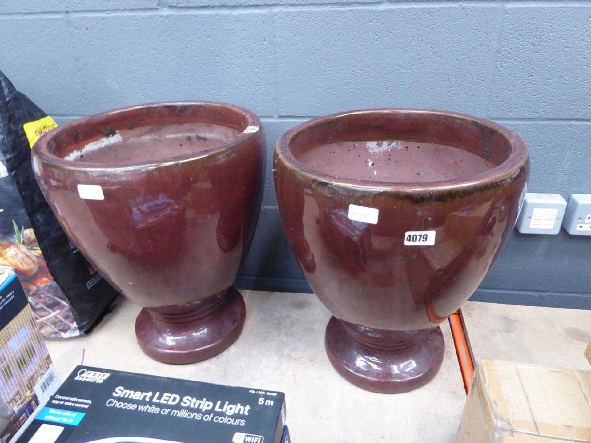 2 large brown pots