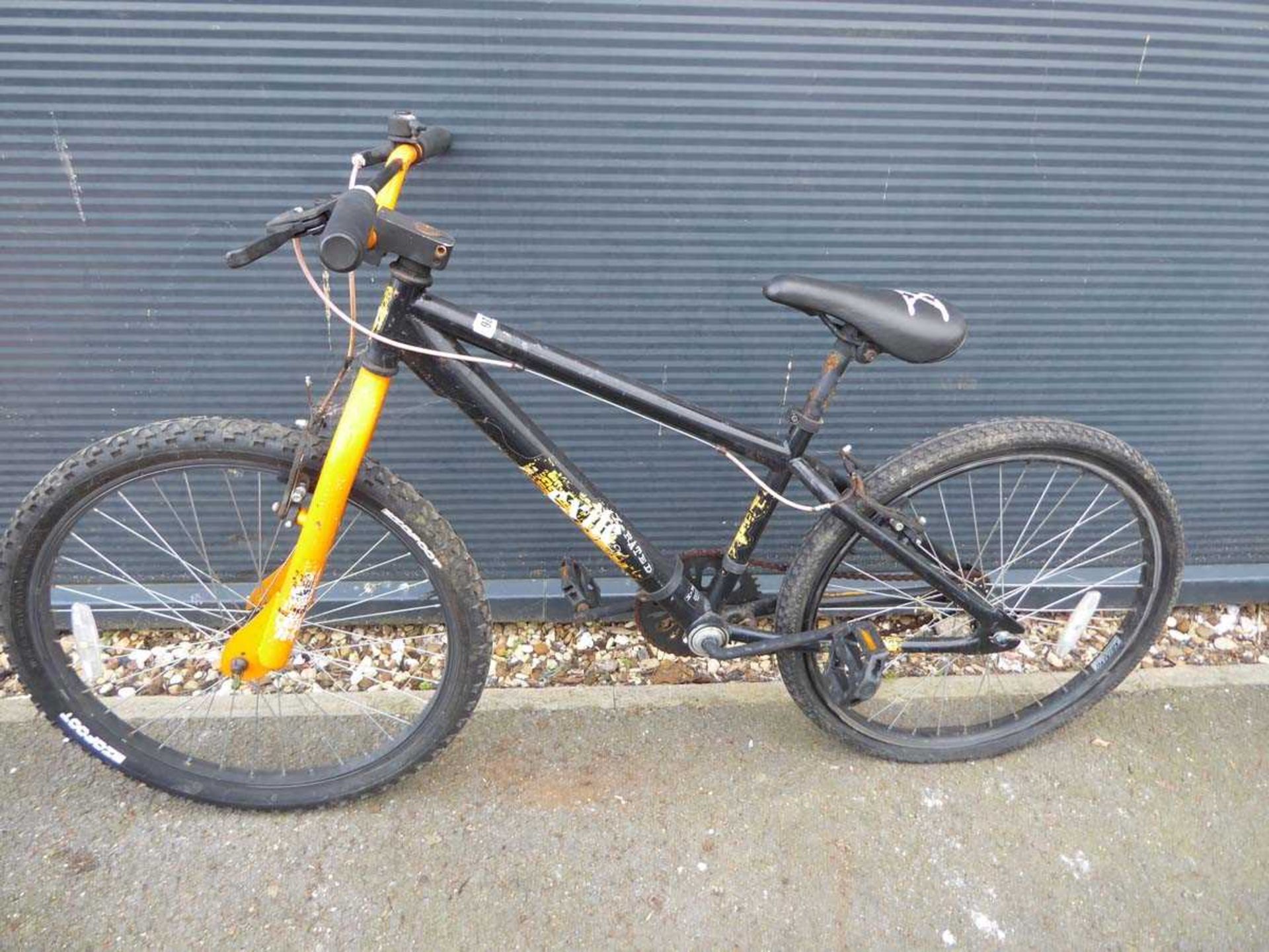 Orange and black child's mountain bike