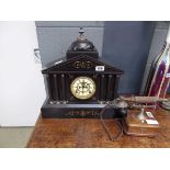 Slate mantle clock with columns to the side