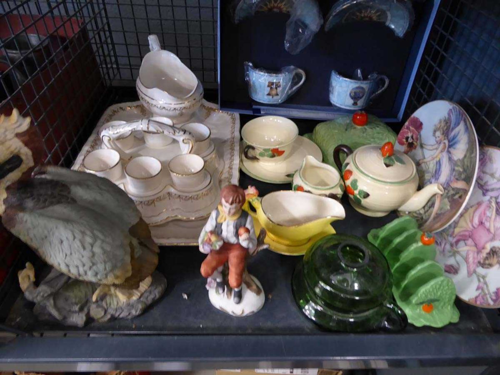 +VAT Cage containing Beswick toast rack, butter dish, cup and saucer set, egg cups, ornamental