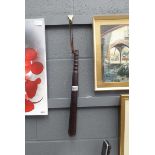 Truncheon with leather strap