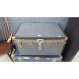 Grey cabin trunk with metal fittings
