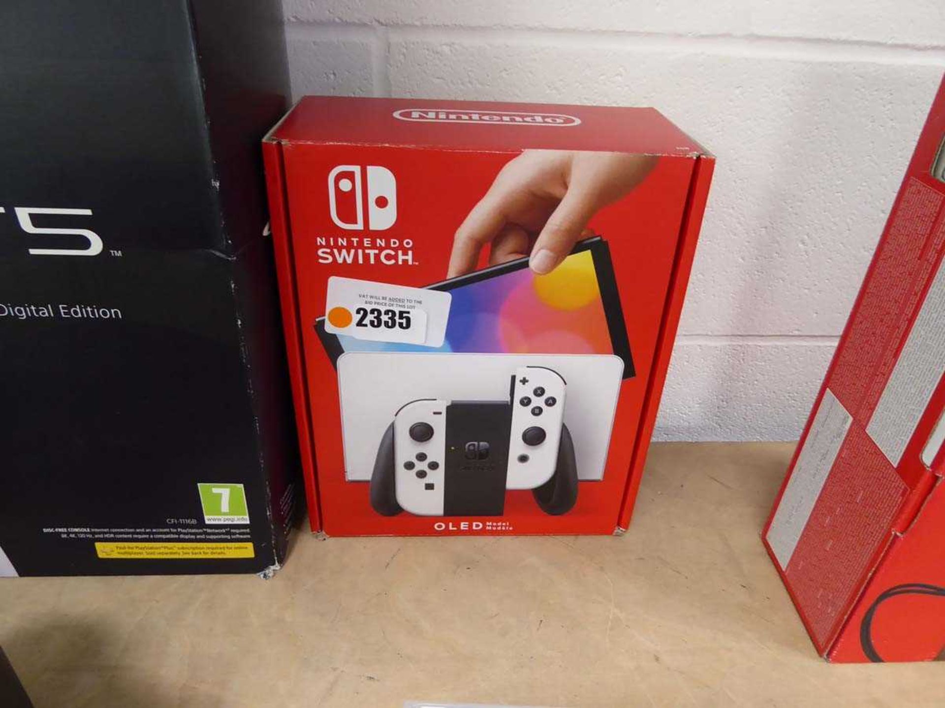 +VAT Boxed Nintendo OLED Switch (af - some small chips on glass display)