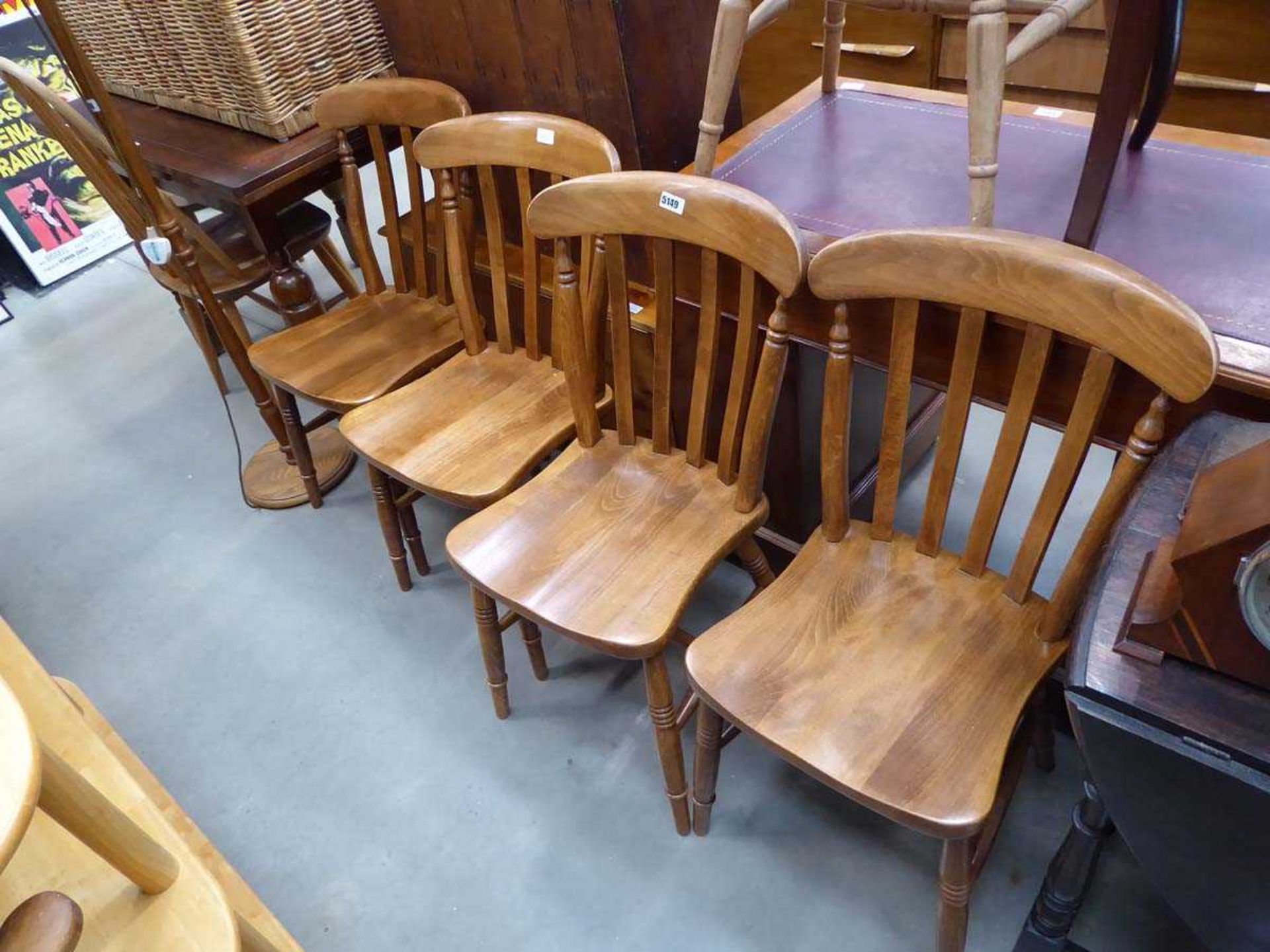 Four beech dining chairs