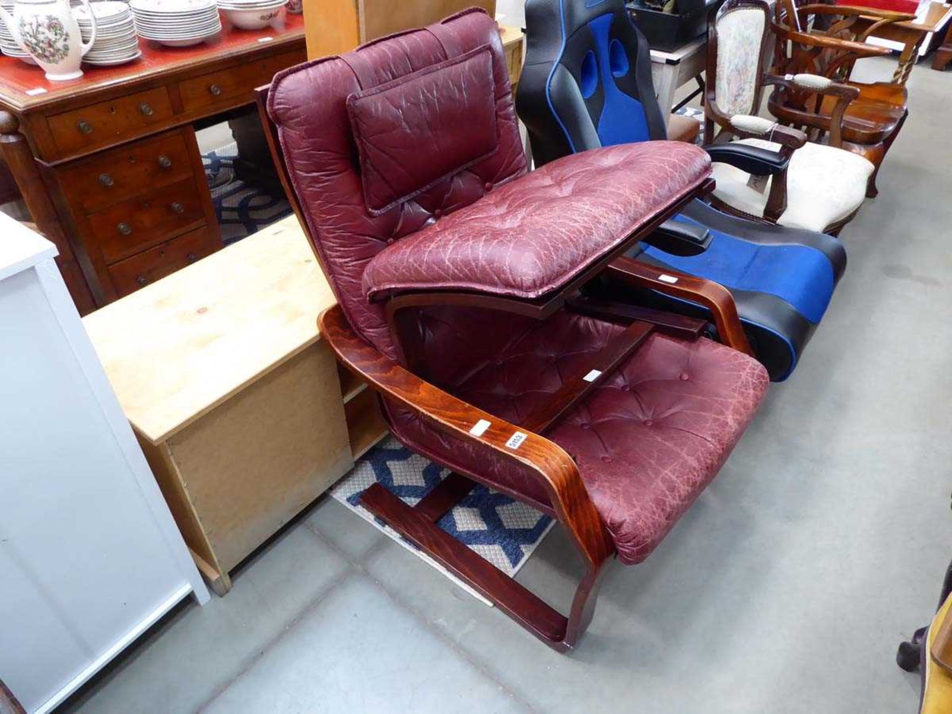 Bentwood armchair with leather cushions and matching footstool