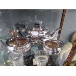 Three piece silver plated tea service plus a silver bud vase