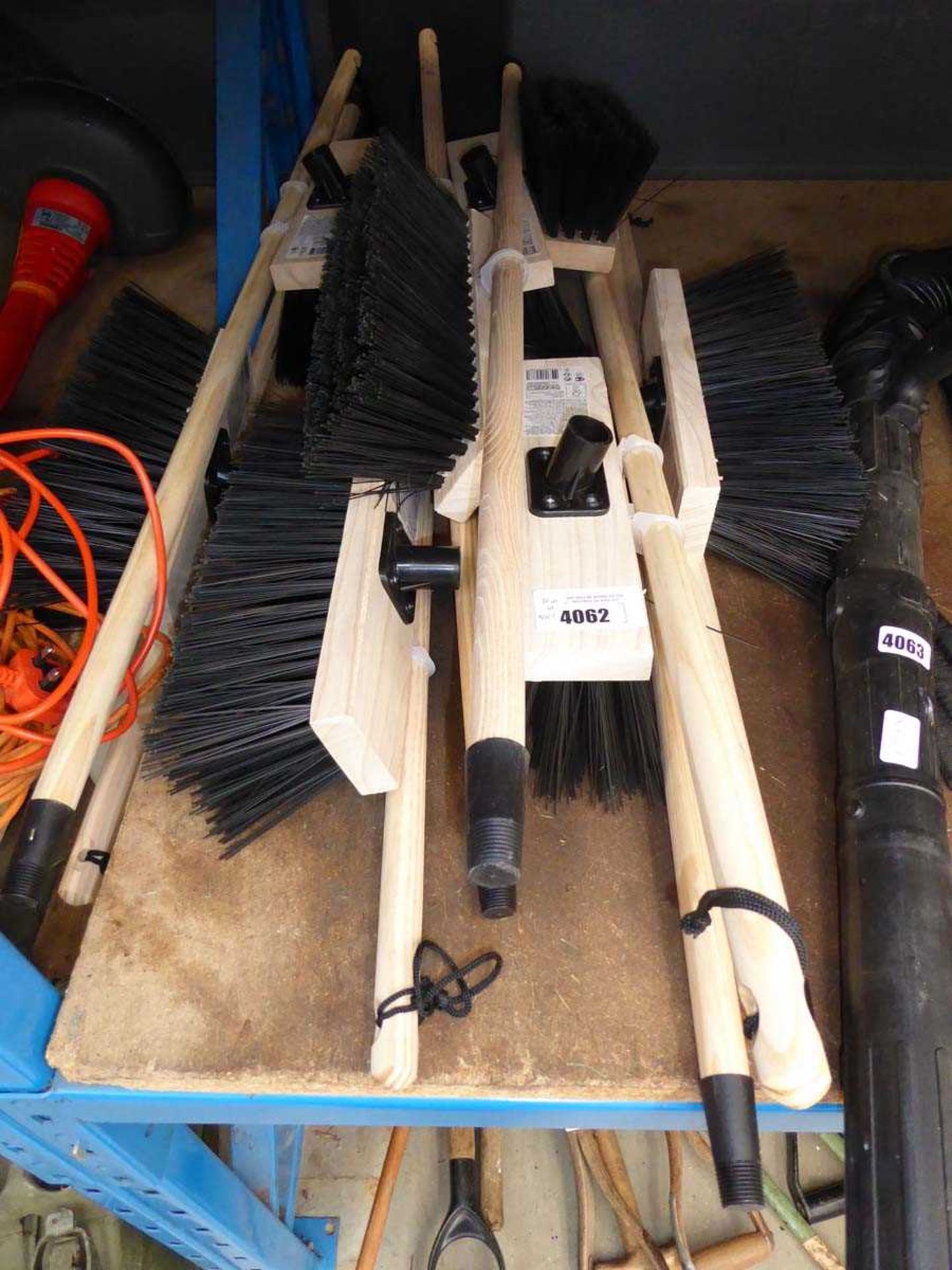 +VAT Ten brooms and handles