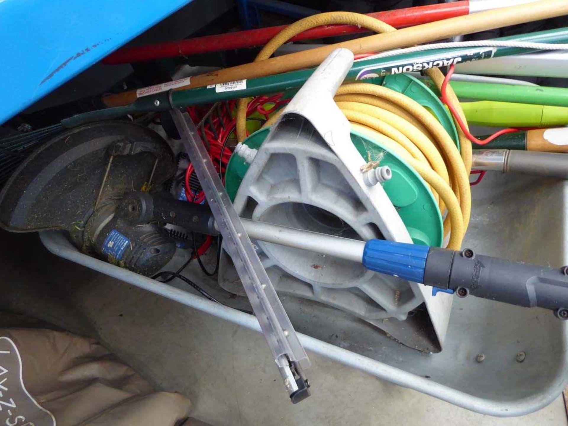 Galvanised wheelbarrow containing various garden tools including battery powered hedge cutters, - Image 2 of 2