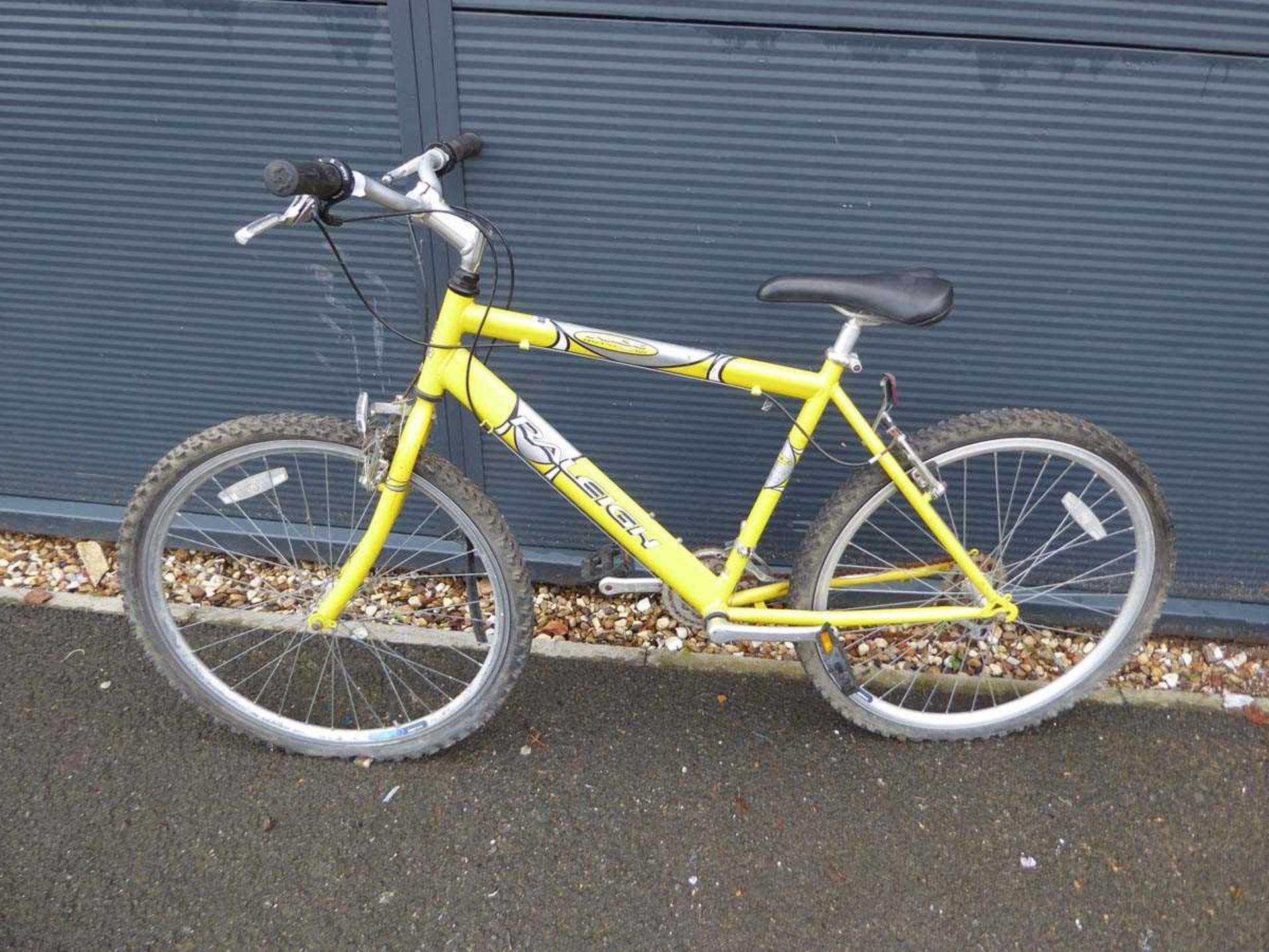 Raleigh yellow mountain bike