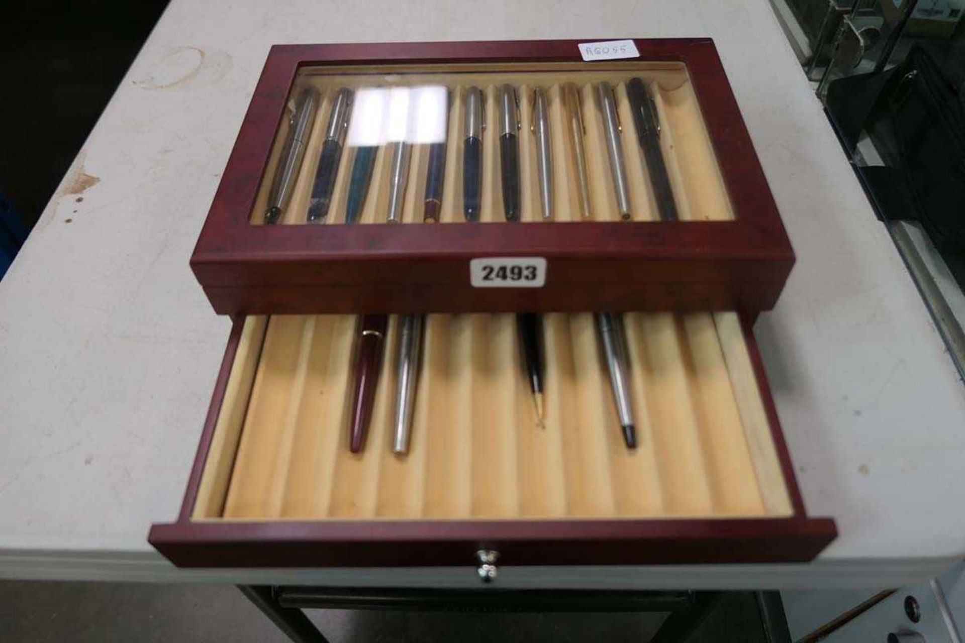 Collection of Parker pens in wooden box