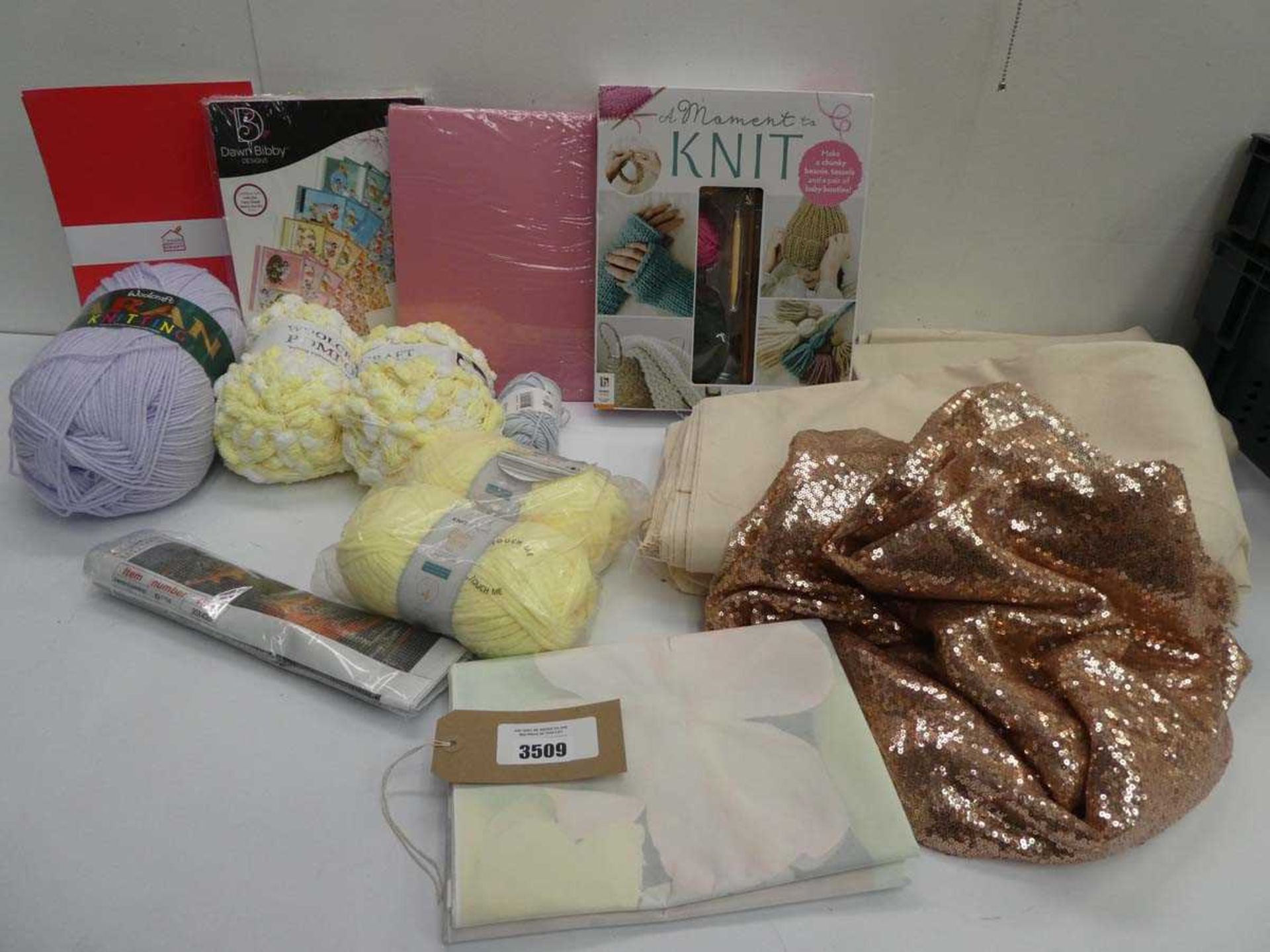 +VAT A moment to knit kit, assorted card, wool and lengths of fabrics.