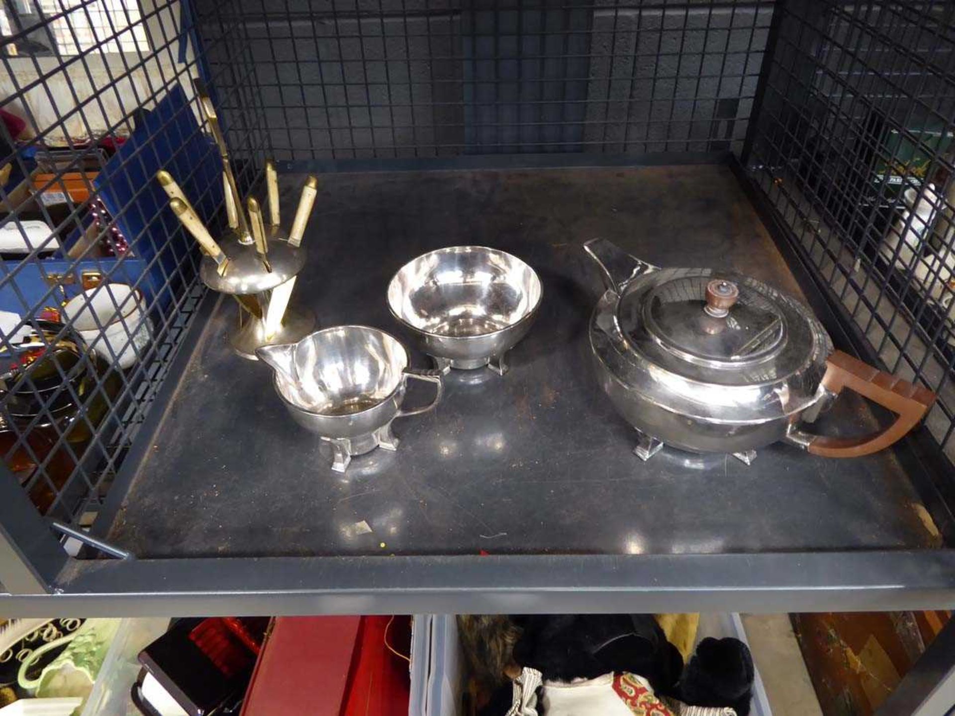 3-piece art deco tea service plus a quantity of butter knives with a stand