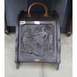 Coal scuttle with carved panels