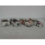 4x 1:18 scale model Ford rally cars: UT Models 1/18 Ford Escort Martini 1000 Miglia 1995 with box,