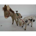 Mechanical wind-up mule & cow toys