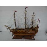 Handmade wooden model of the HMS Victory 1805, mounted on a wooden base, length 92cm approx.
