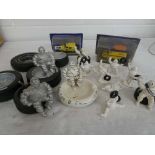 A group of motoring themed collectables including; cast iron mini Michelin figures, die cast