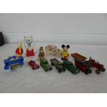 6 playworn die cast vehicles and an assortment of other vintage toys including mechanical model