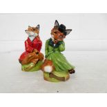 Pair of Royal Stratford fox ornaments, numbers 1880 and 2442 of 2500