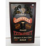 Framed 'Guinness and Sons Finest Extra Stout' reproduction advertising board with smaller Guinness