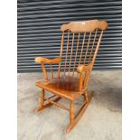 Wooden stick back rocking chair