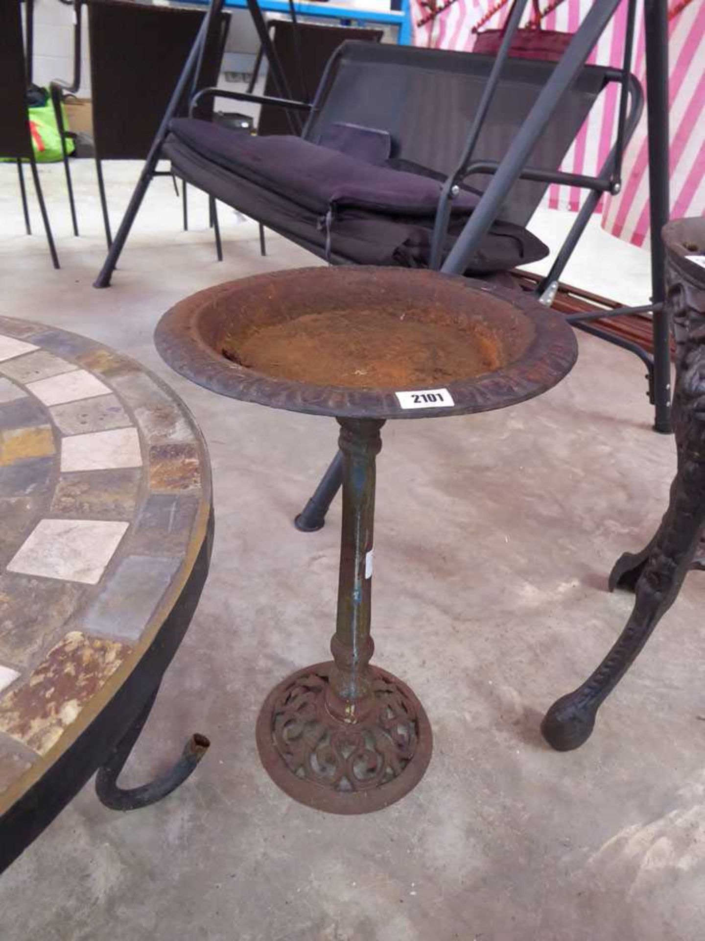 Wrought iron column bird bath