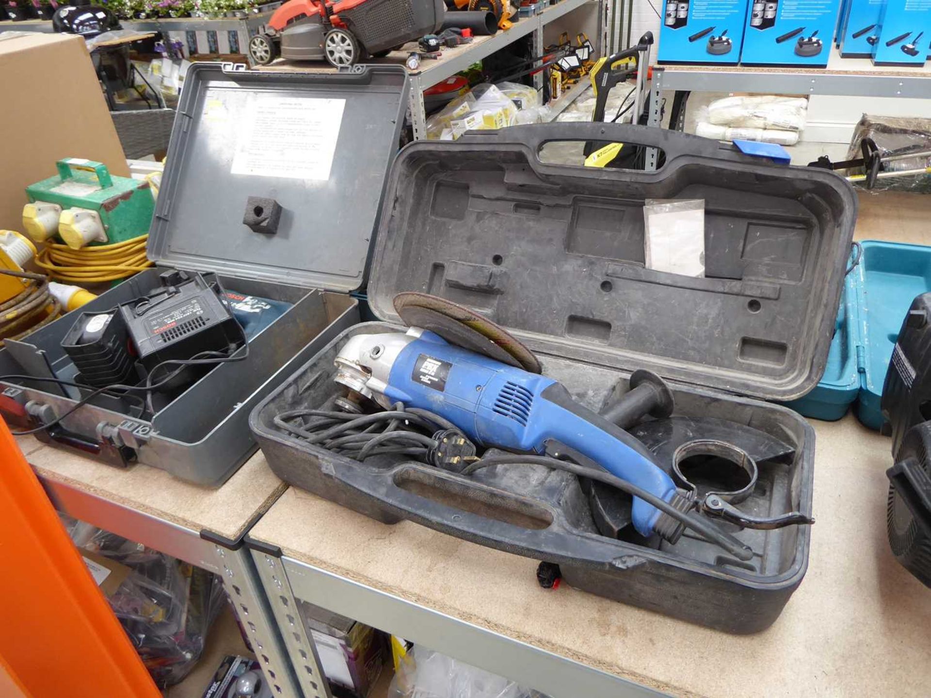 Cased Bosch electric drill, together with a cased 240v angle grinder