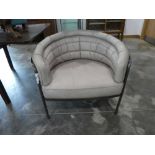 +VAT Modern metal framed tub shaped easy chair in faux leather upholstery in the style of amelie