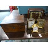 4 various clocks including 3 small metal carriage clocks and an oak cased mantel clock, together