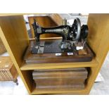 Wooden cased Frister & Rossmann sewing machine serial number 140484