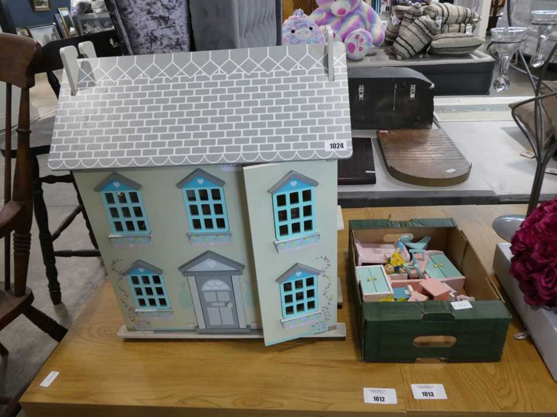 Wooden toy dolls house with box of accessories