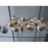 Shelf of WH Goss crested ware