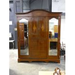 Edwardian mahogany inlaid wardrobe with 2 beveled mirrored doors and 3 low central drawers