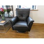 Modern black leatherette upholstered swivel easy chair
