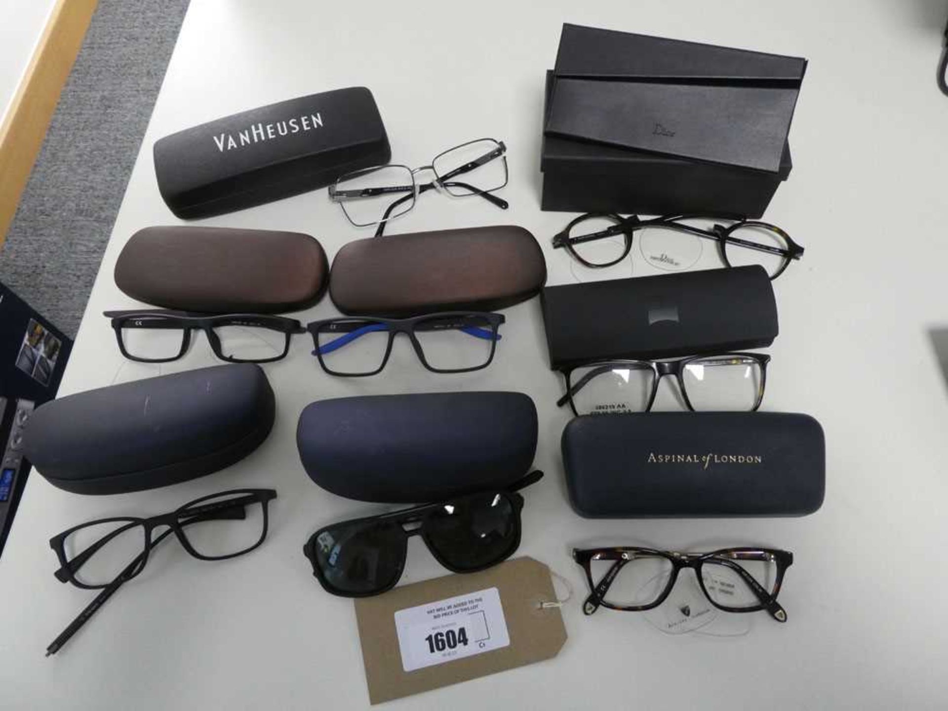 +VAT Nine pairs of designer glasses to include Dior, Caterpillar, Prada, Nike, Zeiss, Nautica (