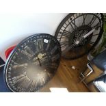 +VAT Chateau de Chambre large circular black and gilt wall clock together with a large mechanical