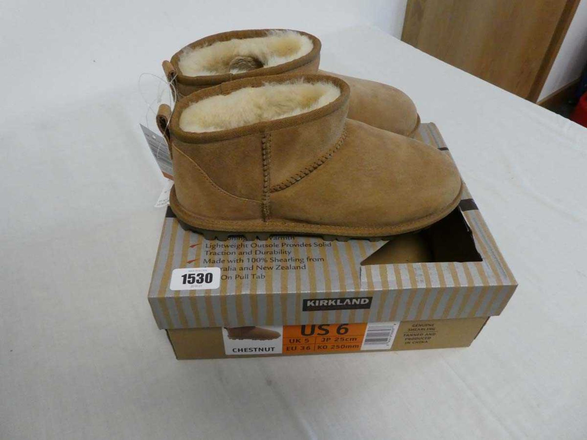 Pair of kids Shearling ankle boots by Kirkland (size 5)