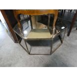 +VAT Metal framed octagonal topped table with bevelled mirror surface