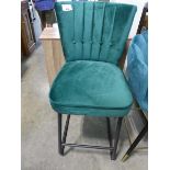 Green suede upholstered bar stool on black metal supports