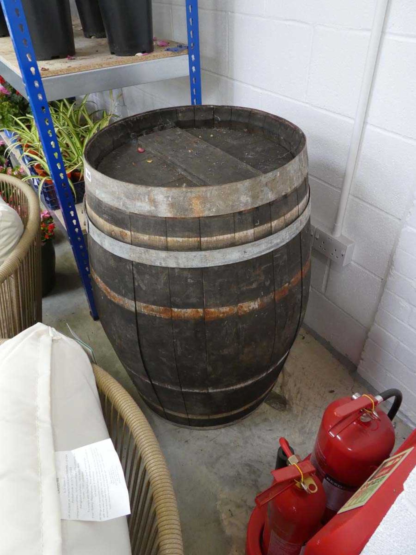 Metal banded oak whiskey barrel